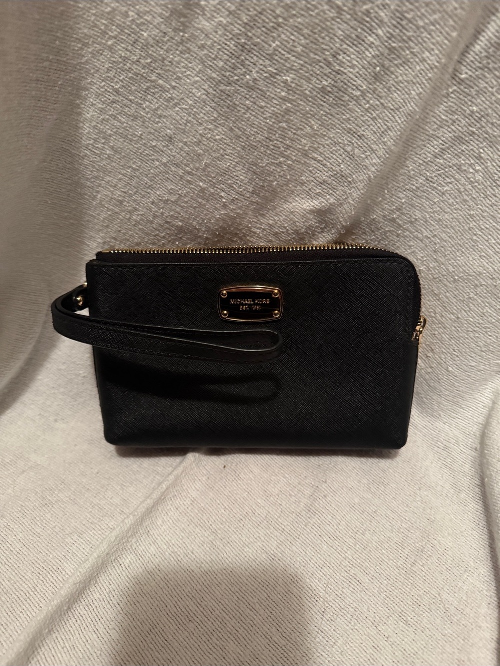 MICHAEL KORS Black Saffiano Leather Wristlet with Gold Plaque